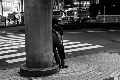 Woman walking on road