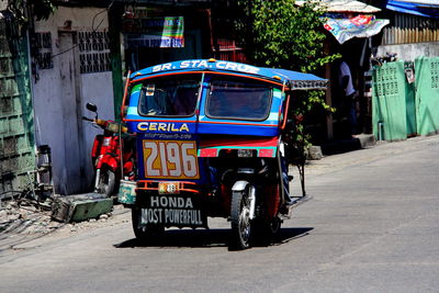 Pedicab on street in city