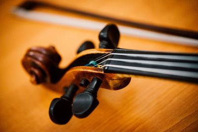 High angle view of guitar on table