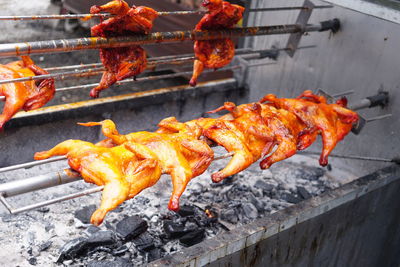 Close-up of meat on barbecue grill