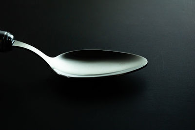 High angle view of coffee on table against black background