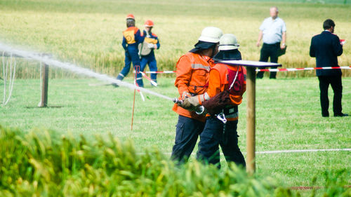 People working on field