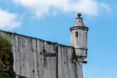 Low angle view of old building against sky