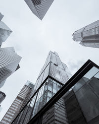 Low angle view of skyscrapers against sky