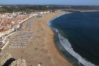 High angle view of beach and buildings in city