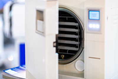 Sterilization desk with autoclave in a dental clinic. sterilization of dental medicine instruments.