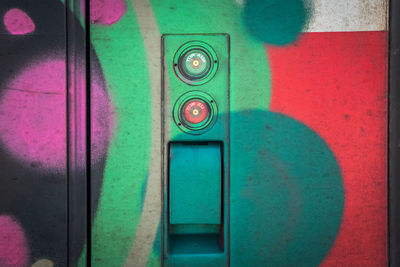 Close-up of multi colored door of building