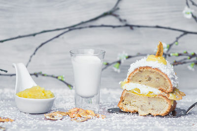 Close-up of cake slice with spatula on table