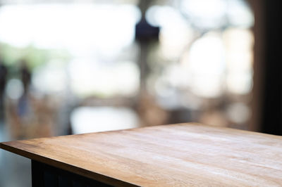 Close-up of empty seats on table in restaurant