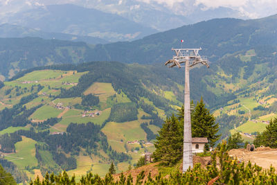 Construction of a new ski lift. support pole, no steel ropes, standing alone on the mountains slope