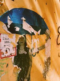 Close-up of graffiti on wall