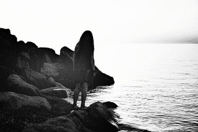 Scenic view of sea against cloudy sky
