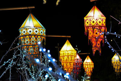 Low angle view of illuminated building at night