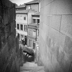 Alley amidst buildings in city