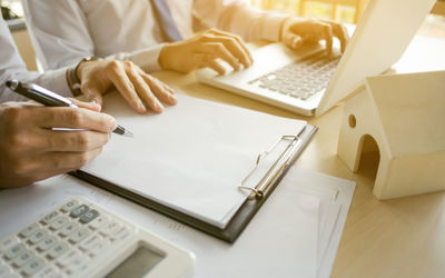 High angle view of man using laptop on table