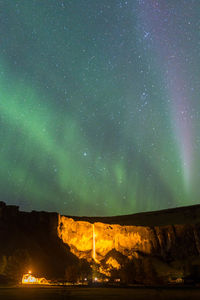 Scenic view of star field against sky at night