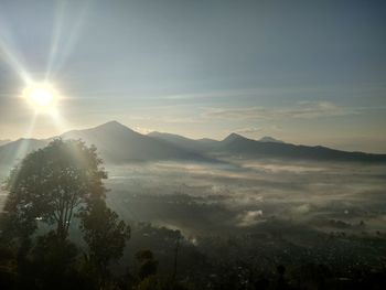 Scenic view of mountains against sky during sunset