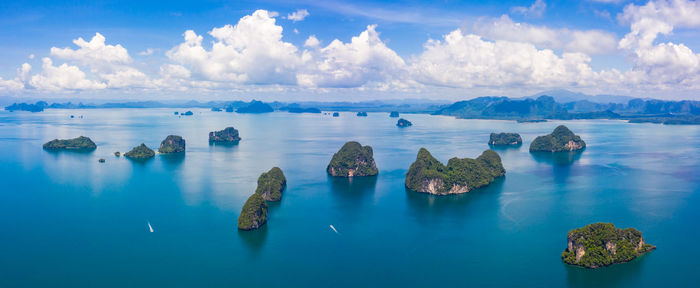 Thailand green lush tropical island in a blue and turquoise sea with islands, krabi