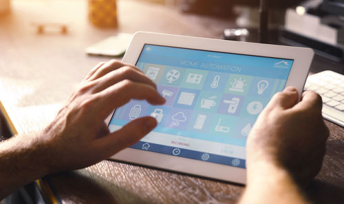 Close-up of man using mobile phone