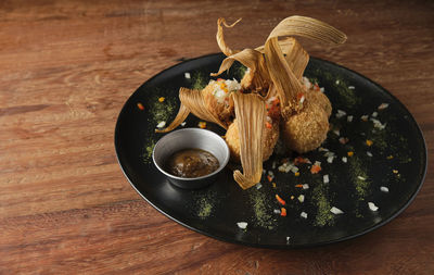 High angle view of food in plate on table