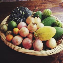 High angle view of apples in basket on table