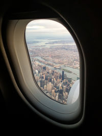 View of landscape through airplane window