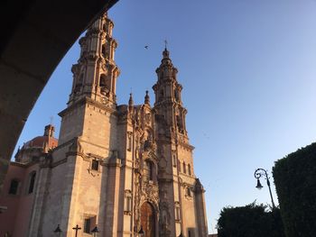 Low angle view of buildings against sky at lagos de moreno mexico