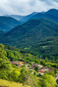High angle view of landscape and mountains against sky