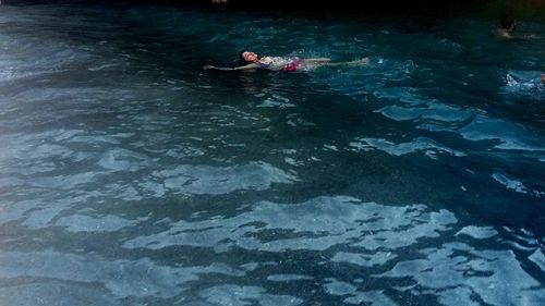 High angle view of person swimming in water