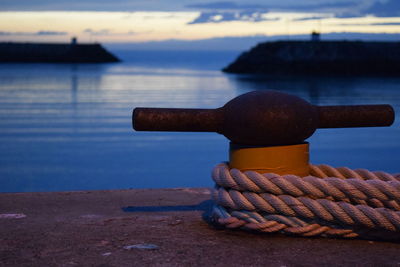 Close-up of harbor against sky