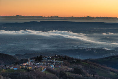 High angle view of townscape against sky during sunset