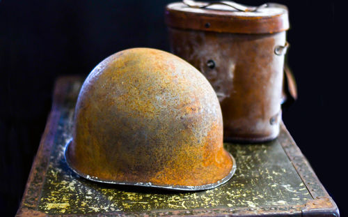 Vintage helmet and canteen from ww 1, on display at a military event