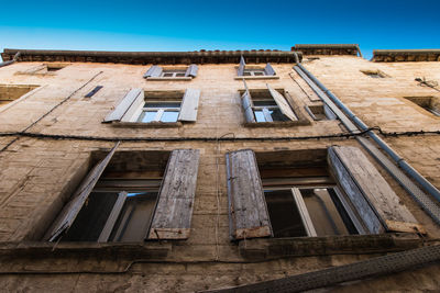 Low angle view of old building against sky