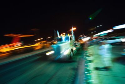 Light trails on car at night