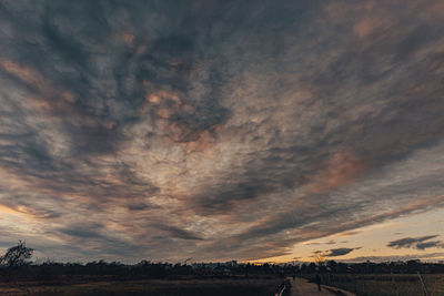 Scenic view of dramatic sky during sunset
