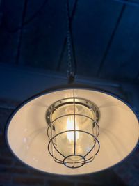 Low angle view of illuminated light bulb