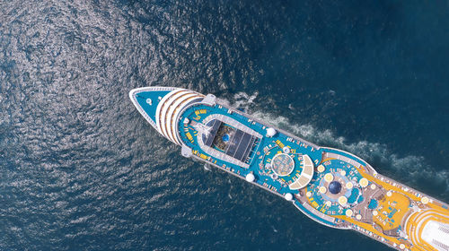 High angle view of multi colored boat in sea against sky