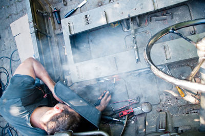 Man welding in workshop