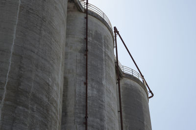 Low angle view of factory against clear sky