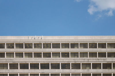 Low angle view of building against blue sky