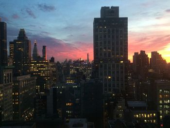 City lit up at dusk