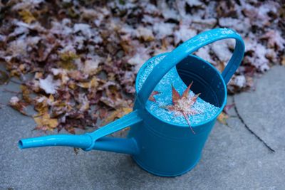 High angle view of blue container on land