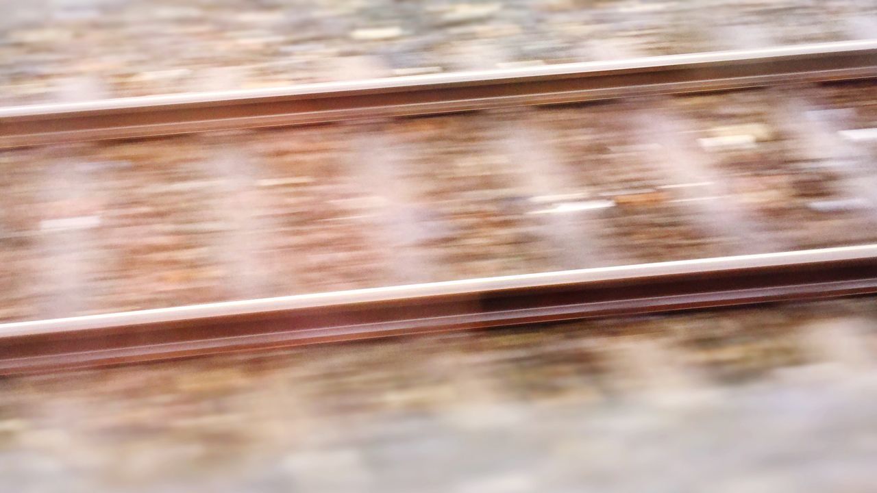 transportation, railroad track, rail transportation, mode of transport, public transportation, blurred motion, motion, train - vehicle, travel, speed, on the move, selective focus, train, railroad station platform, passenger train, land vehicle, railroad station, journey, surface level, vehicle interior