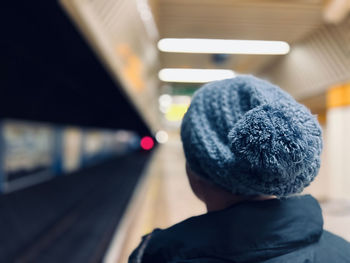 Rear view of woman wearing hat