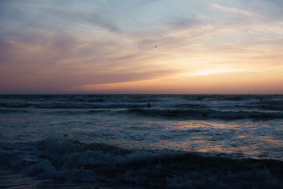 Scenic view of sea at sunset