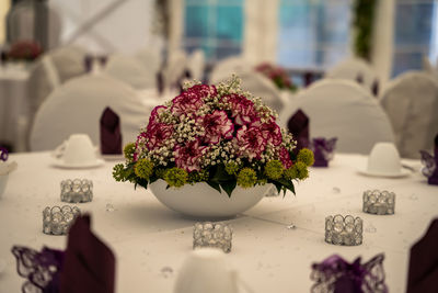 Close-up of purple flowers on table