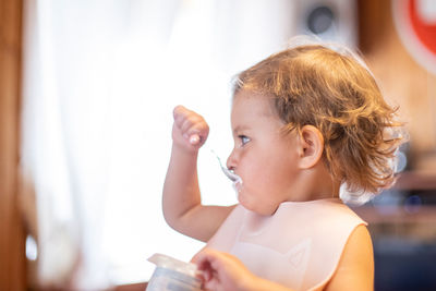 Portrait of cute boy looking away