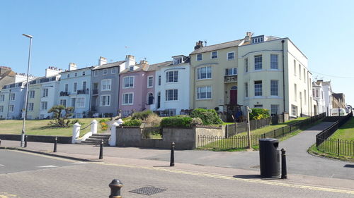 Residential buildings against clear sky