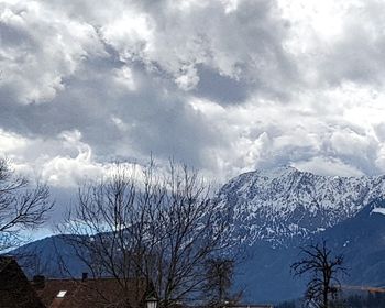 Scenic view of mountains against sky during winter