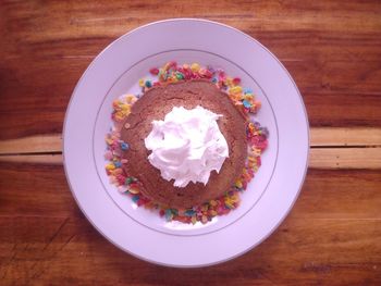 Directly above shot of cupcakes on table